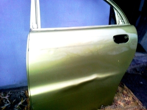 Битая под рехтовку задняя правая дверь на авто Daewoo Lanos   - <ro>Изображение</ro><ru>Изображение</ru> #2, <ru>Объявление</ru> #1254306